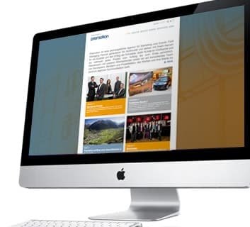 Premotion website in blog style with project pictures on a desktop screen