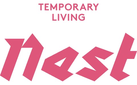 Pink Nest logo with the byline Temporary Living