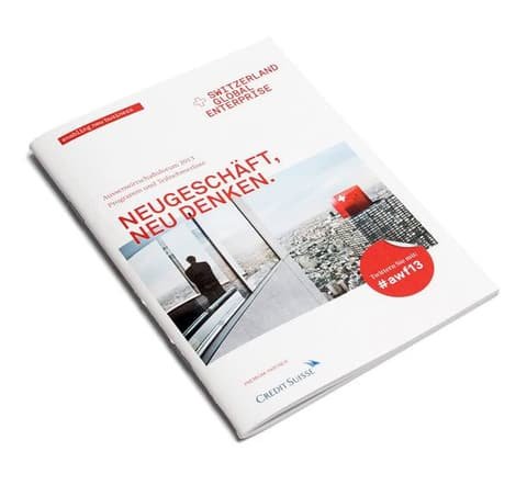Cover of a Switzerland Global Enterprise brochure with red headline and city photographs