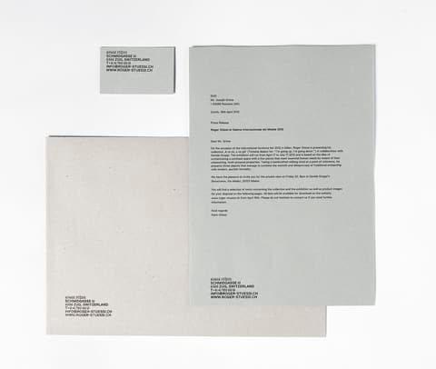 Roger Stüssi stationery with letterhead, grey envelope and business card
