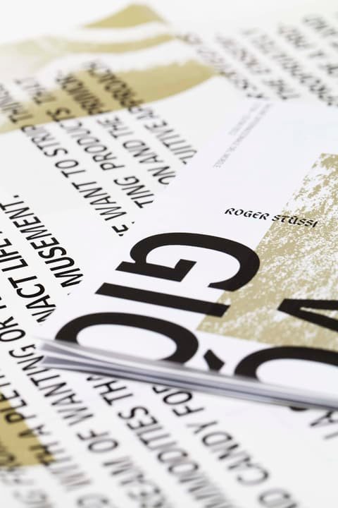 Detail of a Roger Stüssi flyer with gold areas and bold black typography