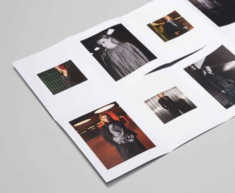 Unfolded Studio Winkler lookbook with fashion photos arranged on white