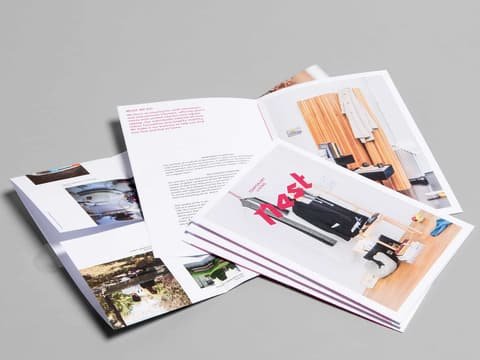 Open Nest brochures with interior photos of the business apartments
